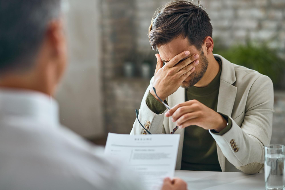man worried about his finances