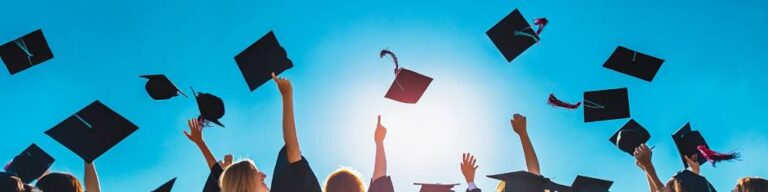 college graduates throwing their caps into the air who now have to deal with student loans