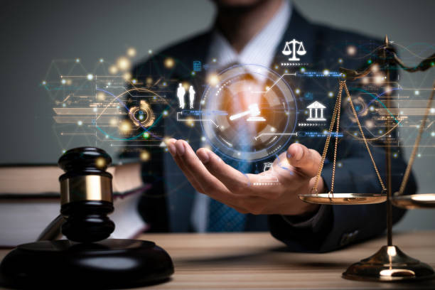 Lawyer's hand concept Justice with Judge gavel, Businessman in suit or Hiring lawyers in the digital system. Legal law, prosecution, legal adviser, lawsuit, detective, investigation, legal consultant.