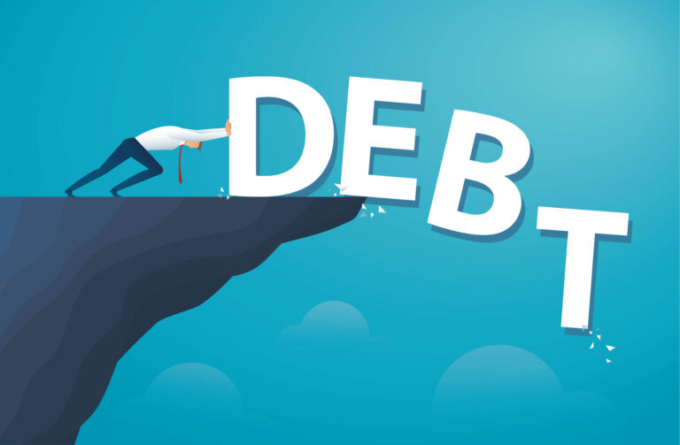 A cartoon image of a businessman pushing the word debt off of a cliff