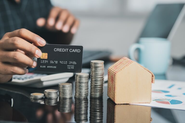 Businessman planning career investment Loan and home ideas are approved with credit card limits.