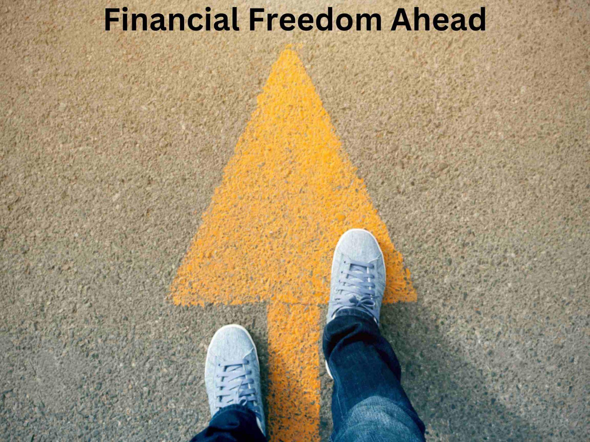 Person standing on a road with an upward pointing arrow painted in yellow, text reads "Weigh Options for Financial Freedom Ahead".