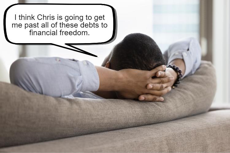 Person reclining on a couch with hands behind their head, thinking about how Chris will help them achieve financial freedom, even after dealing with Chapter 7 Bankruptcy.