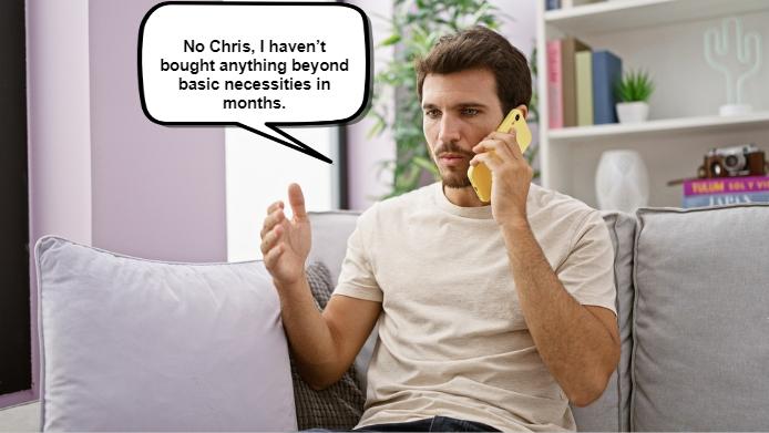 A man sitting on a couch, credit cards untouched, talks on the phone, explaining he hasn't bought anything beyond basic necessities in months, as if each day were a chapter 7 of frugality.